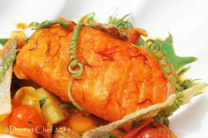 recipe curried salmon sous vide saffron indian coconut milk chayote shoots tomato broth slow cooked trout salmon fillet